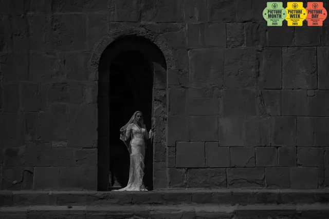 bride ancient stone arch doorway veil georgia church — GOGA Photography