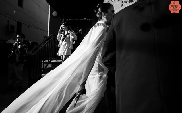 bride cape veil stairs candid street wedding georgia — GOGA Photography