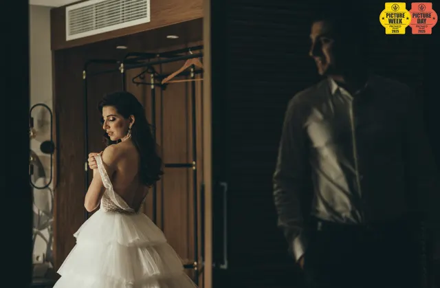 bride groom getting ready hotel room candid warm — GOGA Photography
